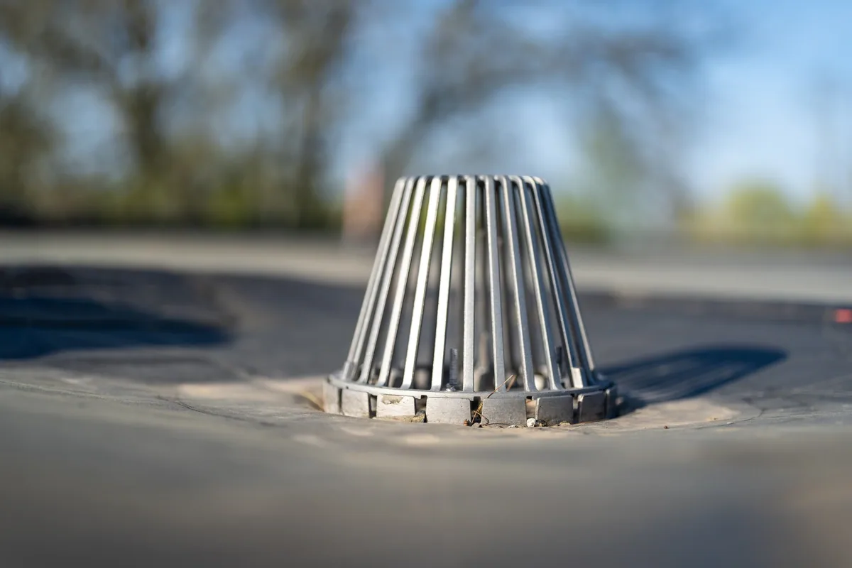 Commercial Roof Drain and Scupper Repair in Bryan, TX